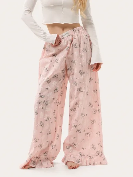 Pantaloni da casa rosa con motivo mimosa