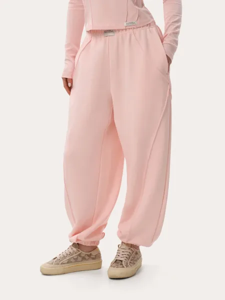 Joggers rosa con cuciture decorative