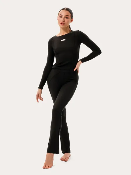 Completo a costine nero: manica lunga e leggings a campana