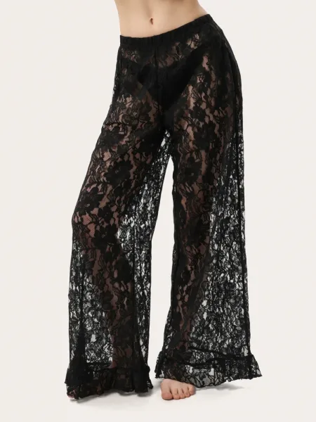 Pantaloni in pizzo neri con volant