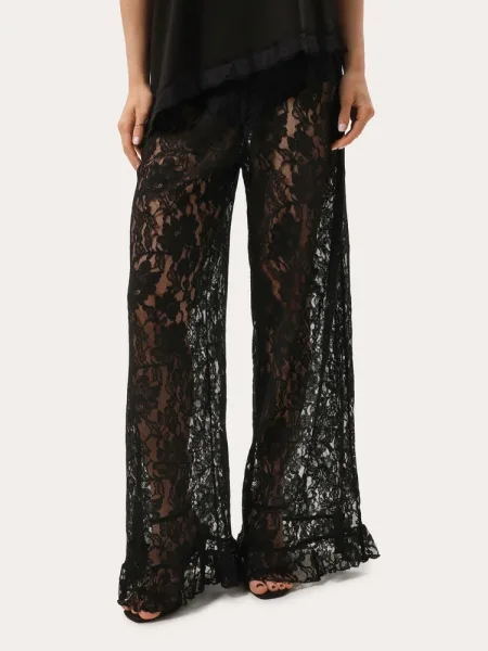 Pantaloni in pizzo neri con volant