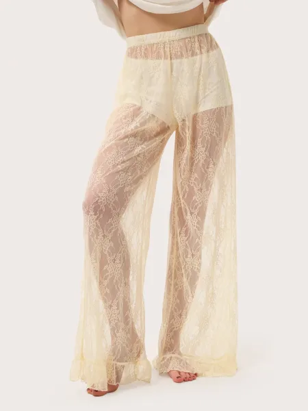 Pantaloni in pizzo crema con volant