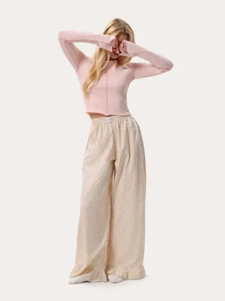 Pantaloni leggeri con ruches e stampa a bacche