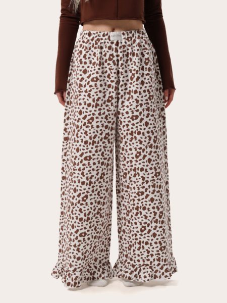 Pantaloni da casa in flanella color latte con stampa leopardata