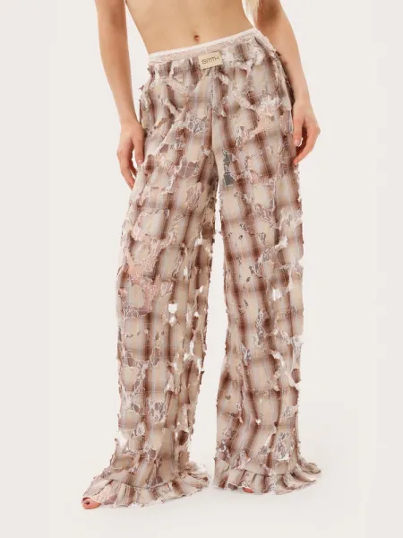 Pantaloni a quadri con ruches e pizzo