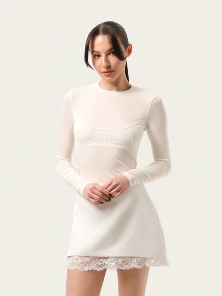 Maglia slim lunga semi-trasparente color latte in tencel con pizzo sul décolleté
