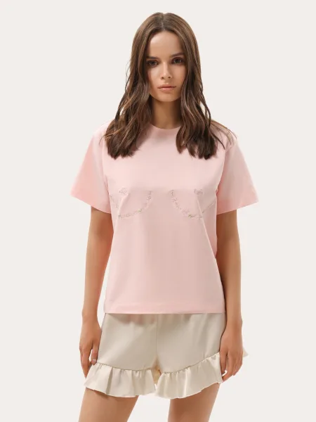 T-shirt rosa con ricamo sul petto