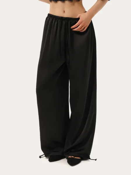 Pantaloni neri in seta con coulisse regolabili