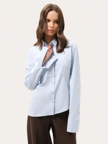 Camicia azzurra slim fit con fondo asimmetrico