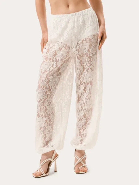 Jogger in pizzo color latte