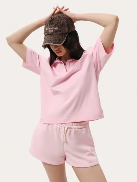 Polo rosa dal taglio ampio