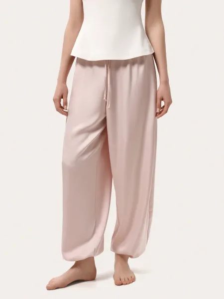 Pantaloni effetto seta rosa cipria con coulisse sul fondo